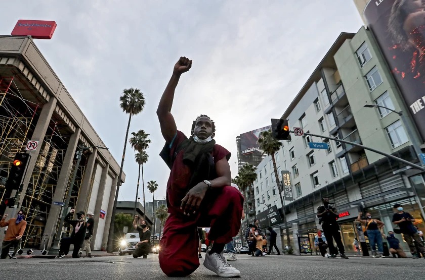 Participants in a George Floyd memorial march and rally in Hollywood on May 25, 2021.(Luis Sinco / Los Angeles Times)